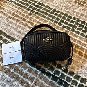 Coach Belt bag
Black quilted leather 
Adjustable Strap 
7 inch w 4.5 inch d